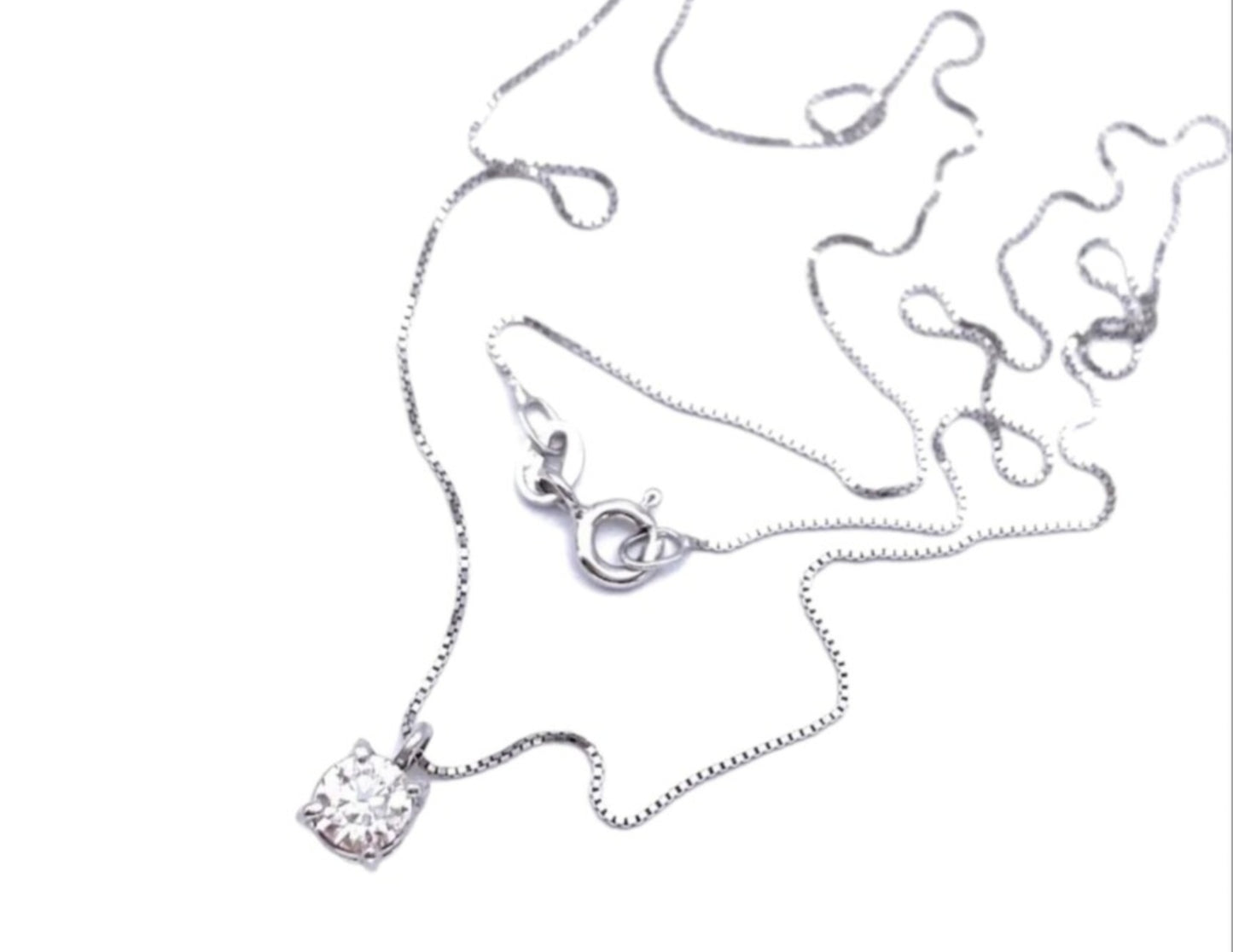 HRD certified light point pendant in white gold and 0.15ct natural diamond