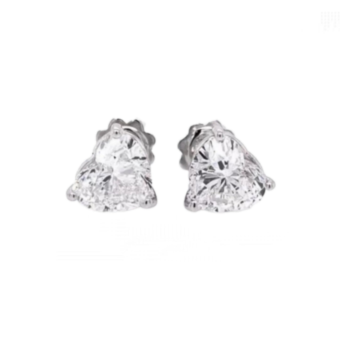 orecchini punto luce in oro bianco 18k e 2 diamanti naturali taglio cuore 0,30 ct